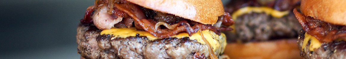 Eating Burger at Tomy's Hamburgers restaurant in Garden Grove, CA.